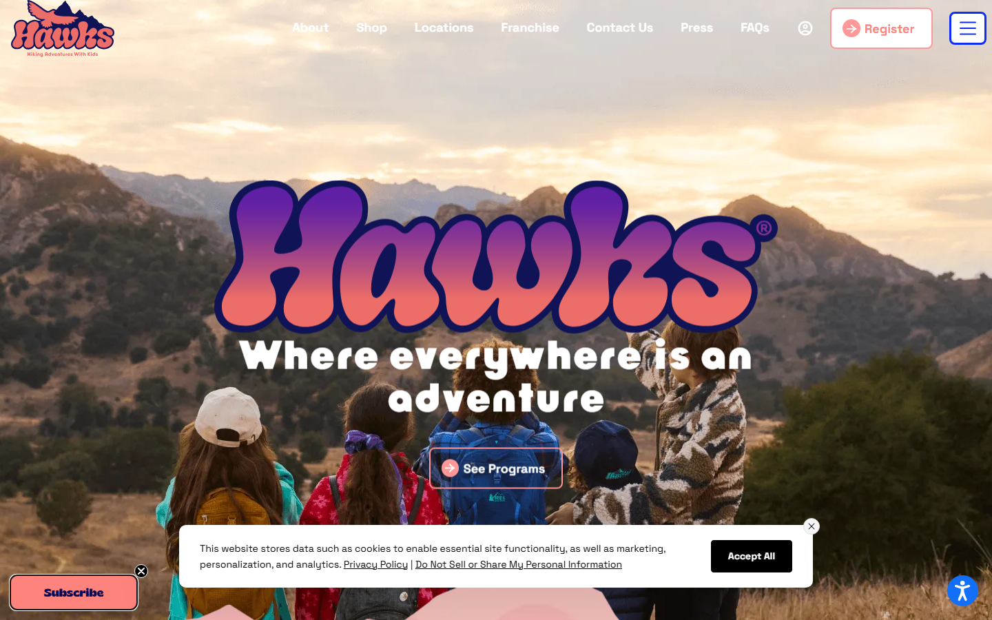 HAWKs homepage, desktop, 1440px, 'Where everywhere is an adventure' with mountain backdrop and children