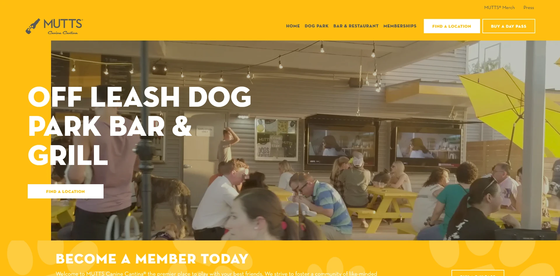 CyberMark's Mutts Canine Cantina website, with bright yellow branding and an outdoor patio photograph